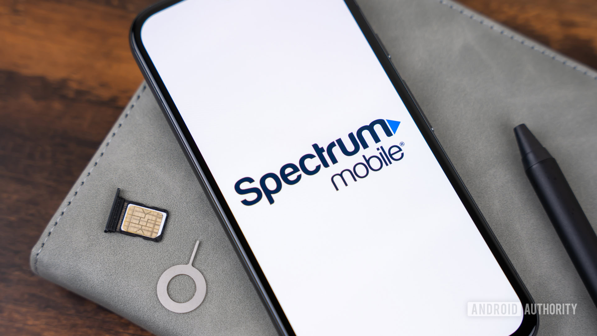 Λογότυπο Spectrum Mobile στο smartphone Στοκ Φωτογραφία (2)