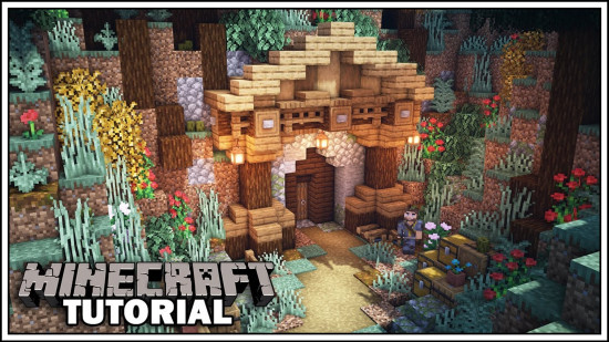 A Minecraft cave entrance build with a building front and natural decor.