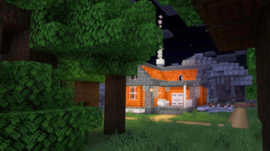 A black and orange Minecraft house built from resin and blackstone.