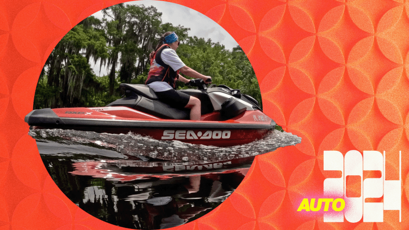  a sea doo on the water with a person riding it