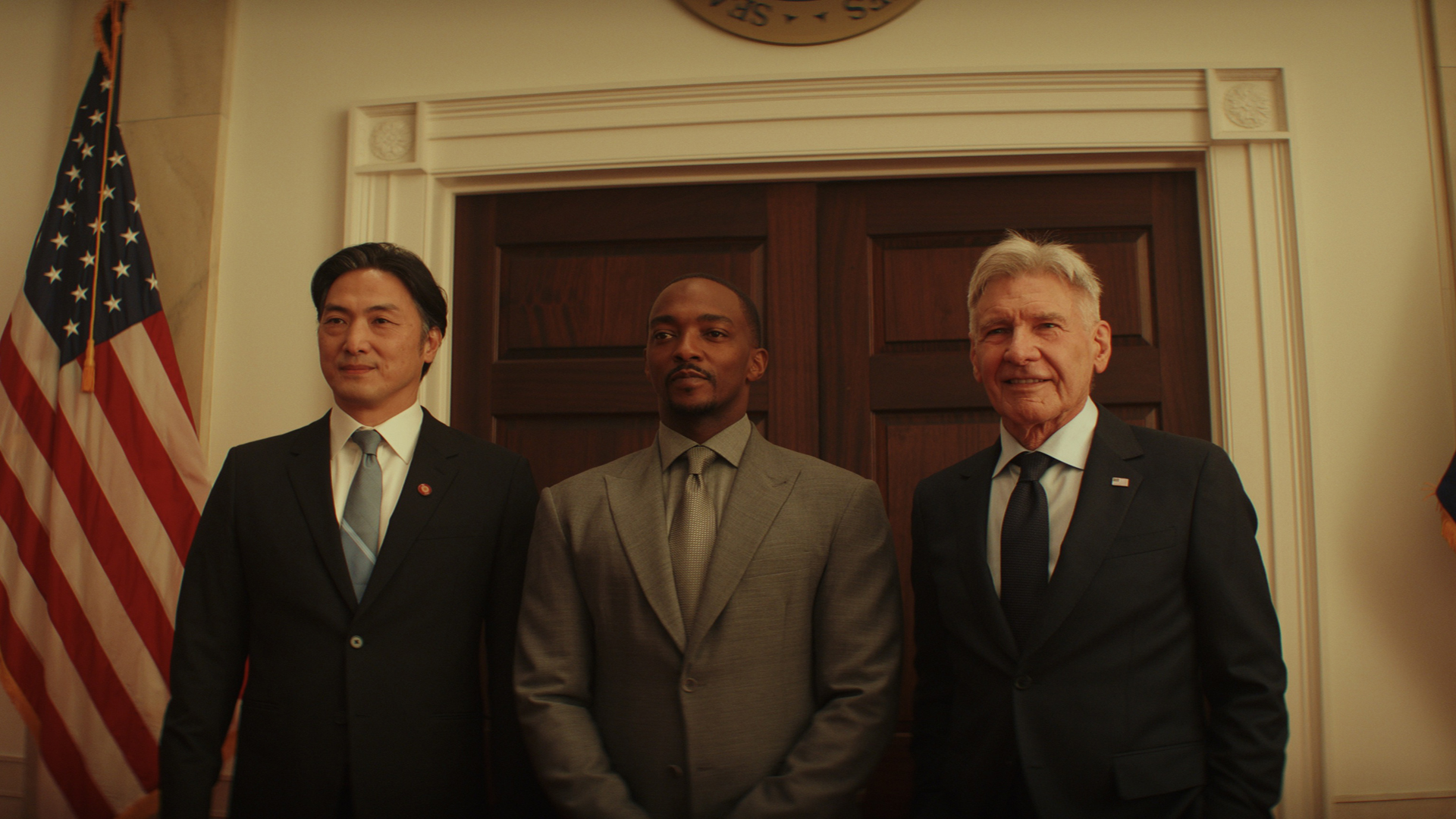 Prime Minster Ozaki, Sam Wilson, and President Thaddeus 'Thunderbolt' Ross pose for images in Captain America 4